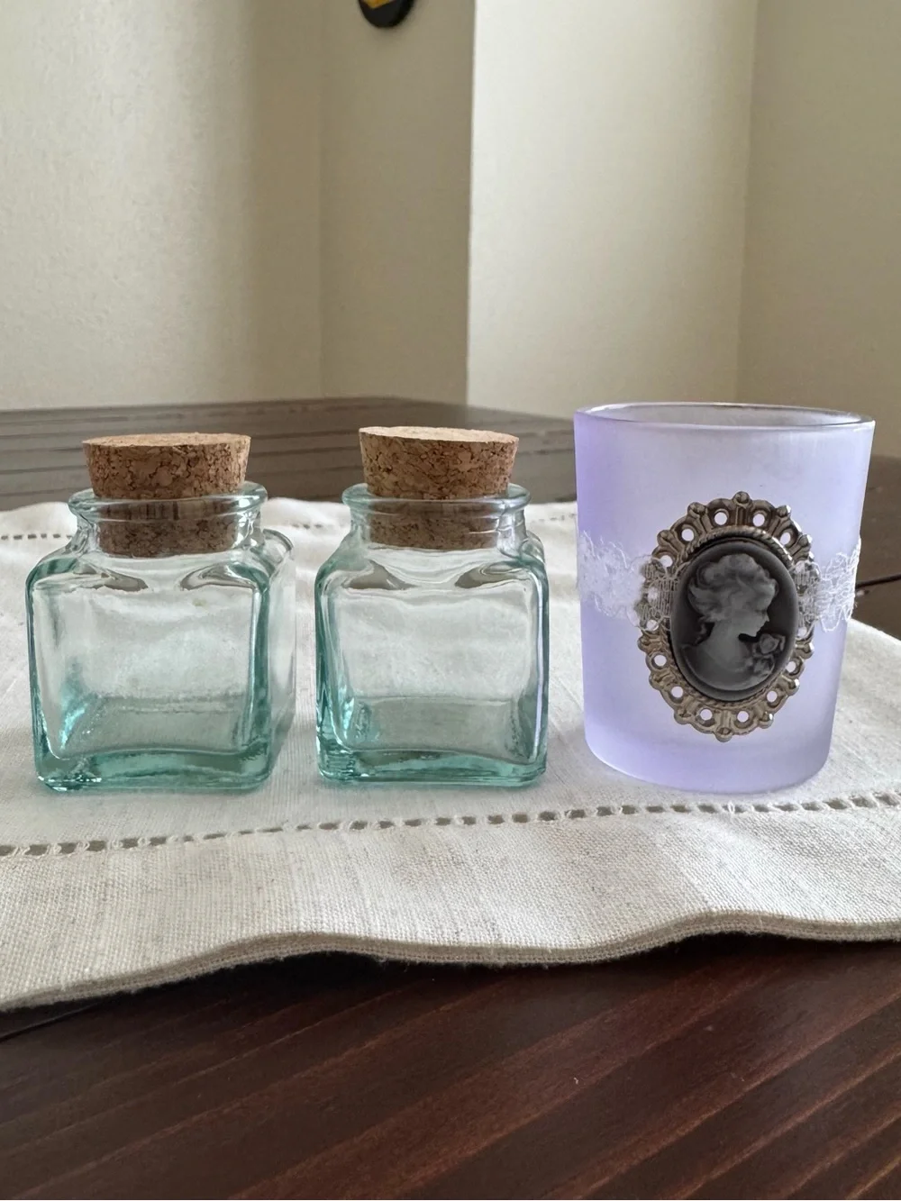 Set of 2 Mini Glasses Jars and 1 Votive Candle Holder.